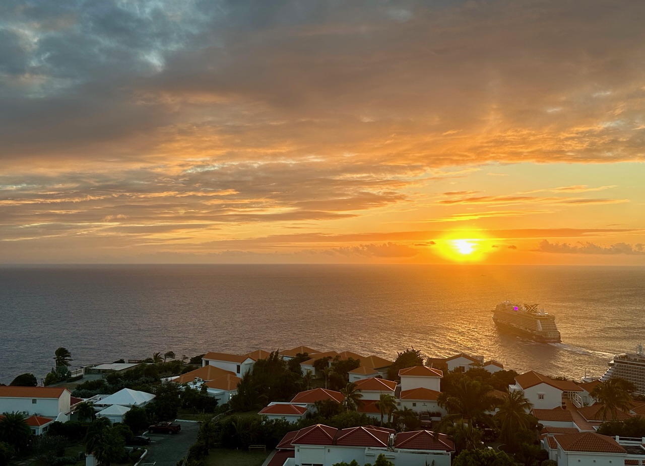 Golden sunset over the ocean near Panorama Residences.