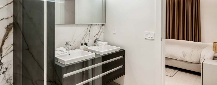 Marble bathroom and bedroom detail.